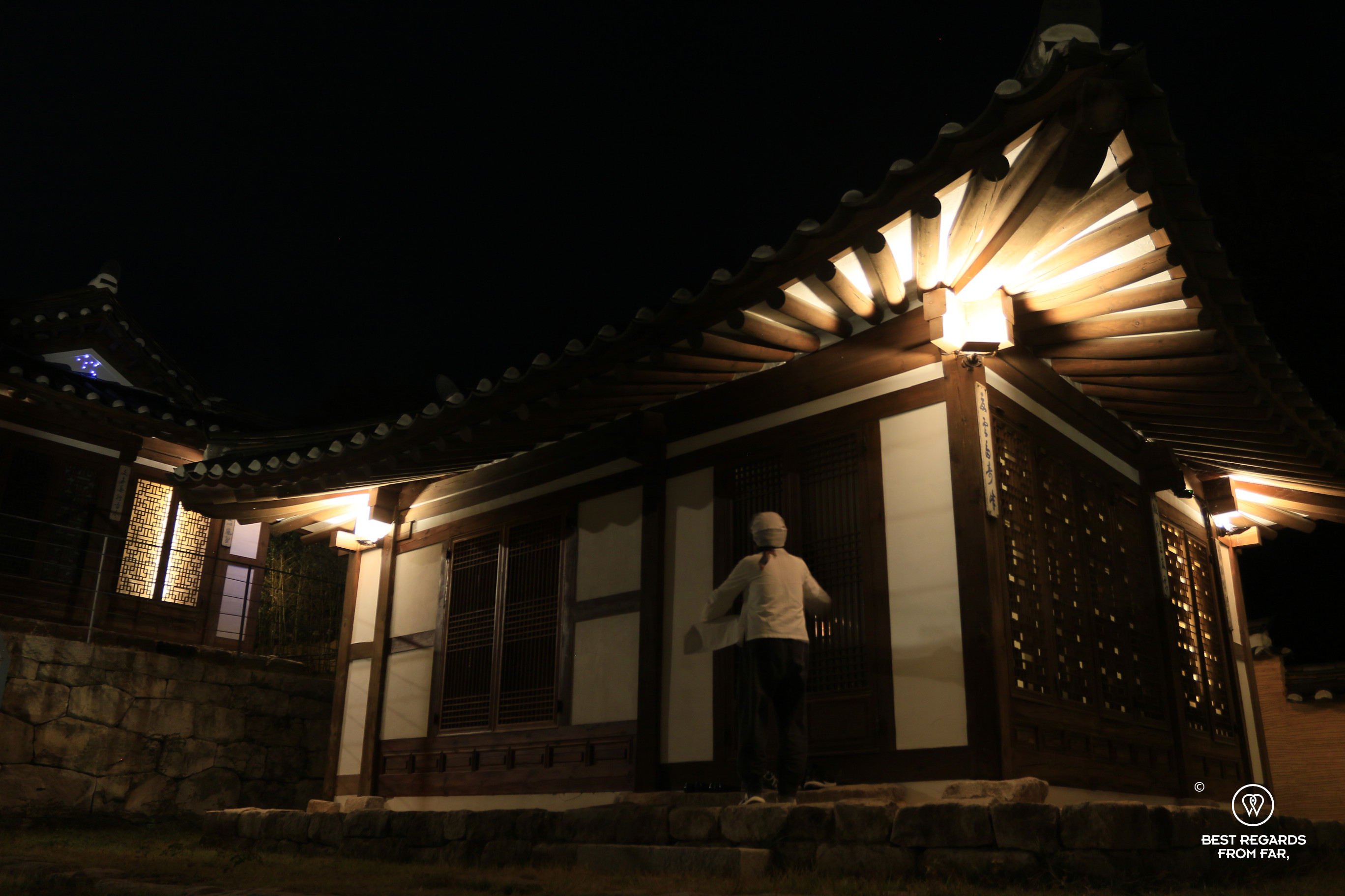 Room service bringing dinner at night to a traditional hanok room of the Hahoe Rakkojae hanok hotel.