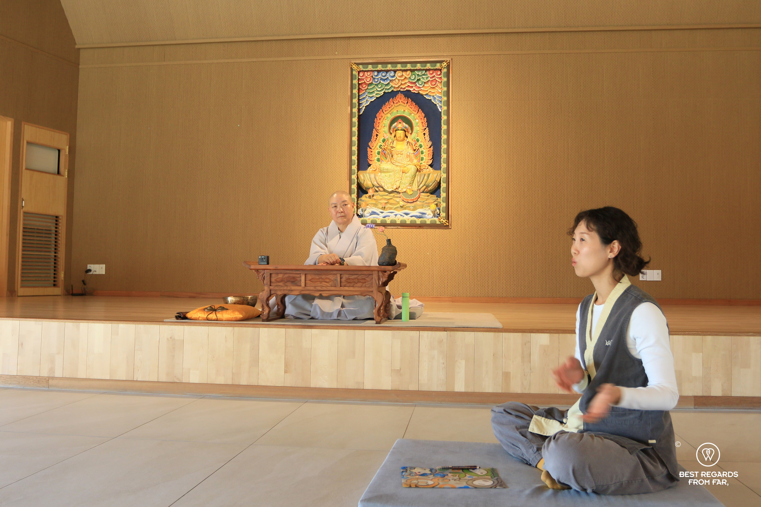 Monk Jiwol and interpreter during the Naksansa temple stay.