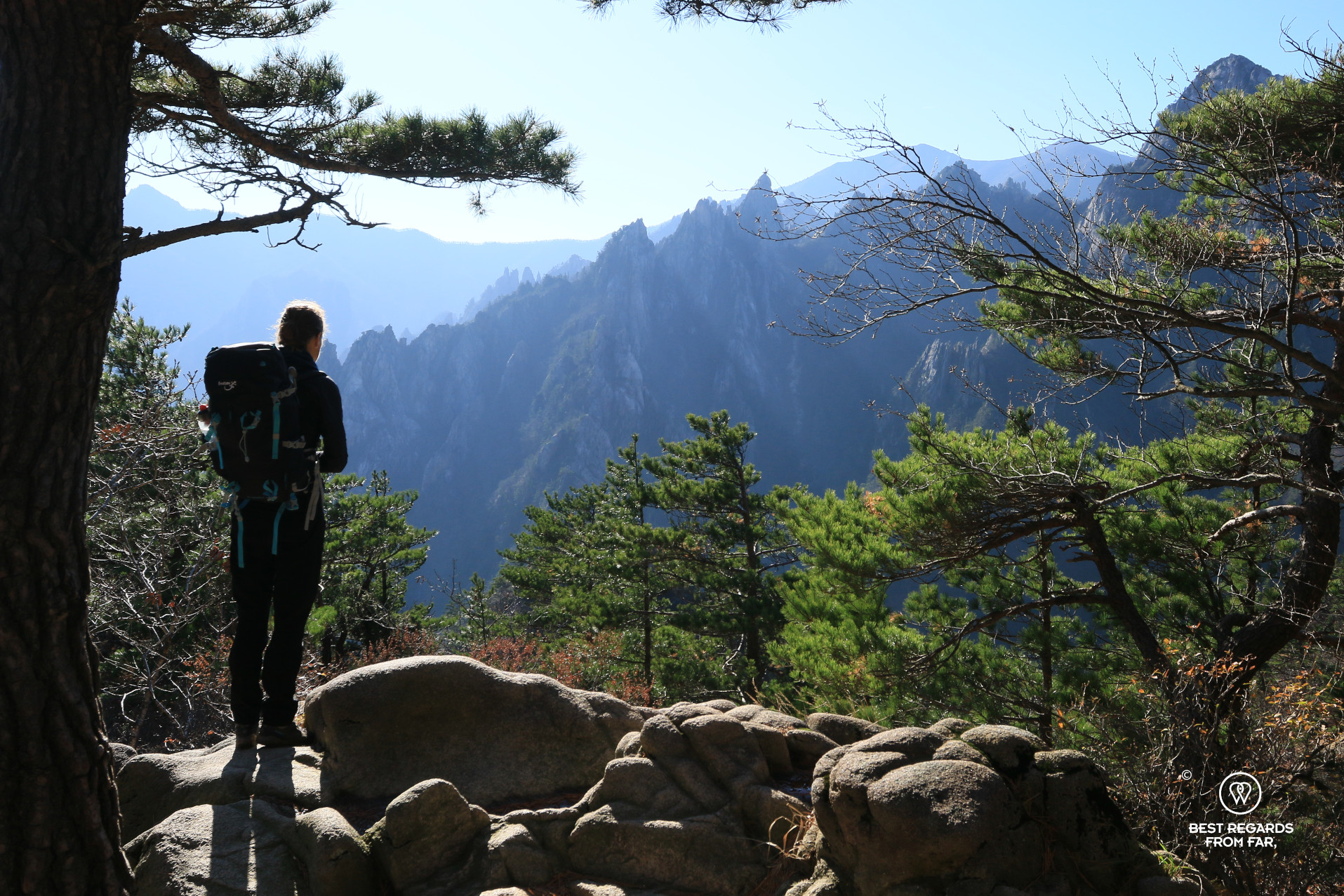 Hiker contemplating the Dinosaur Ridge line, Seoraksan NP, South Korea.