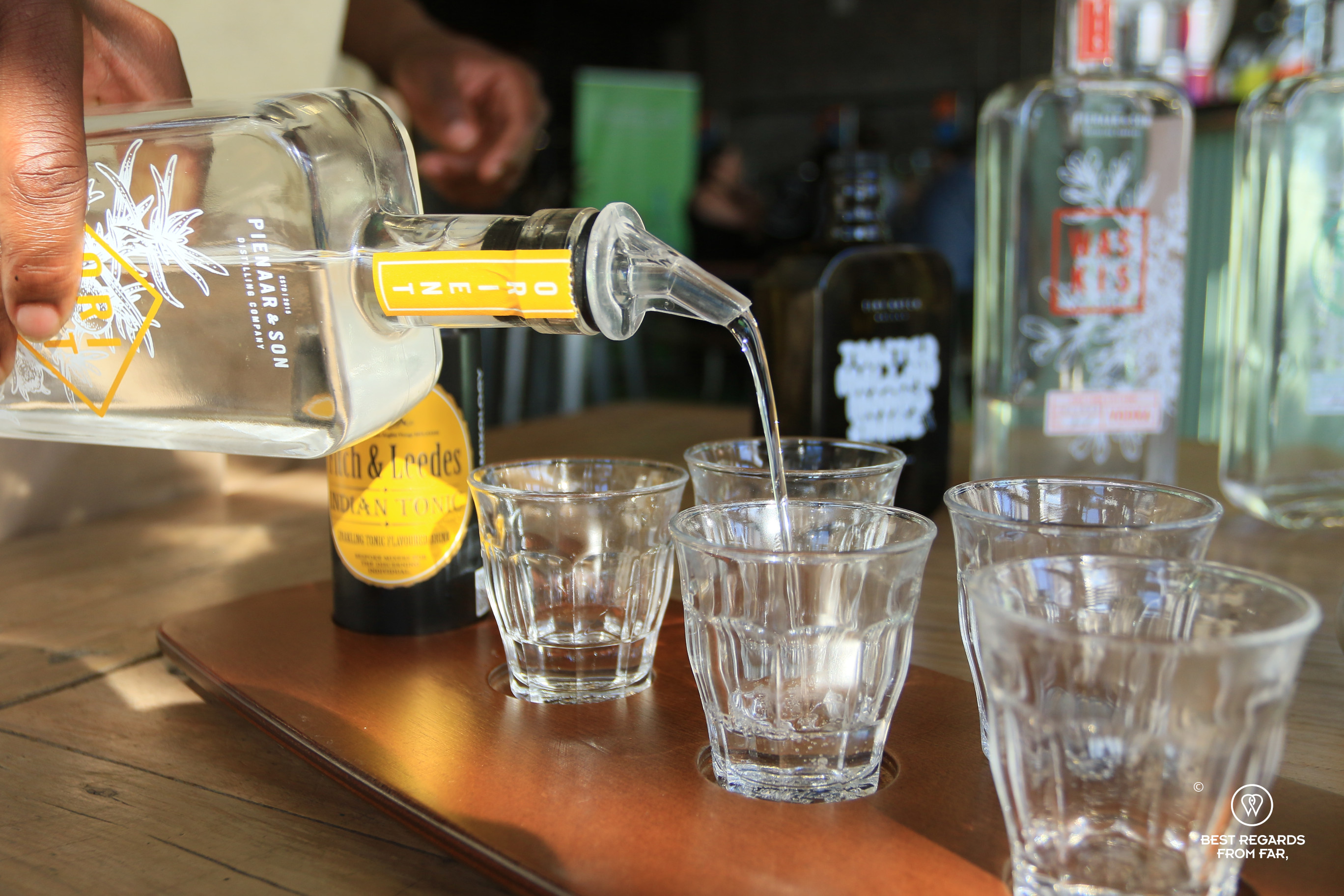 Pouring gin for a tasting at Pienaar and Son in Cape Town.