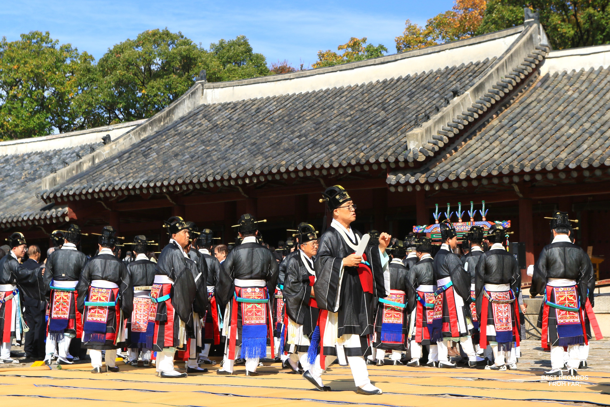 Men in traditional attire during the Grand ancestral rite at the Jongmyo Shrine in Seoul.