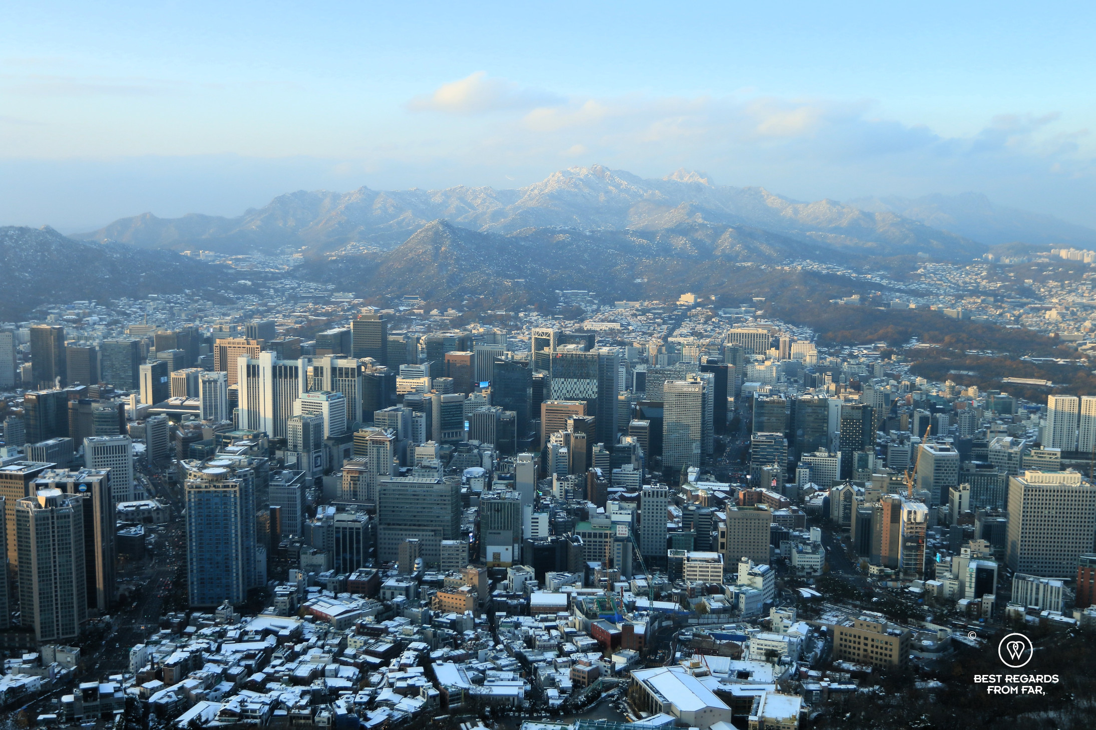 View on Seoul and the snow-capped mountains from the N Seoul Tower.