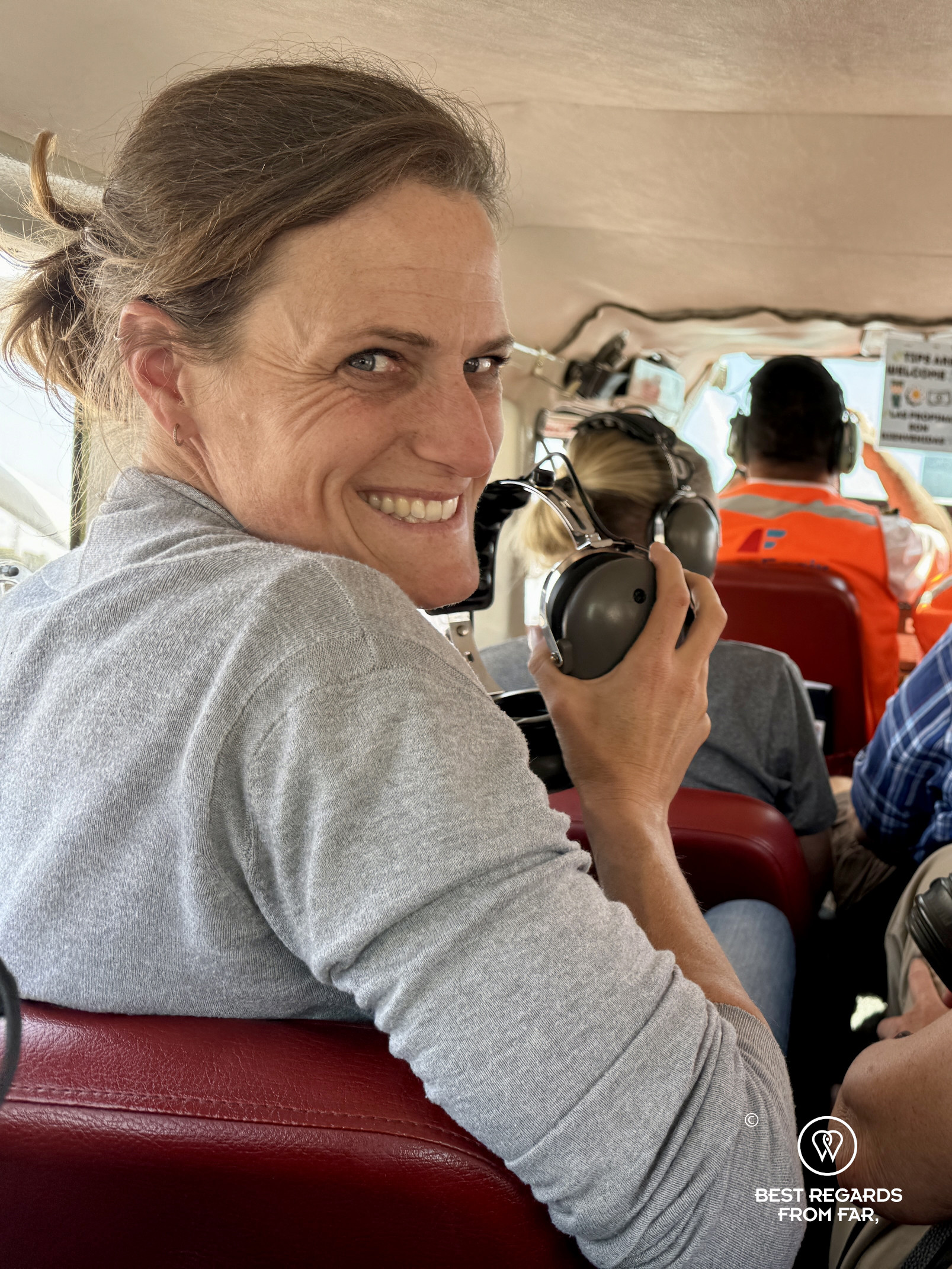 Author Marcella van Alphen aboard the Cessna aircraft.