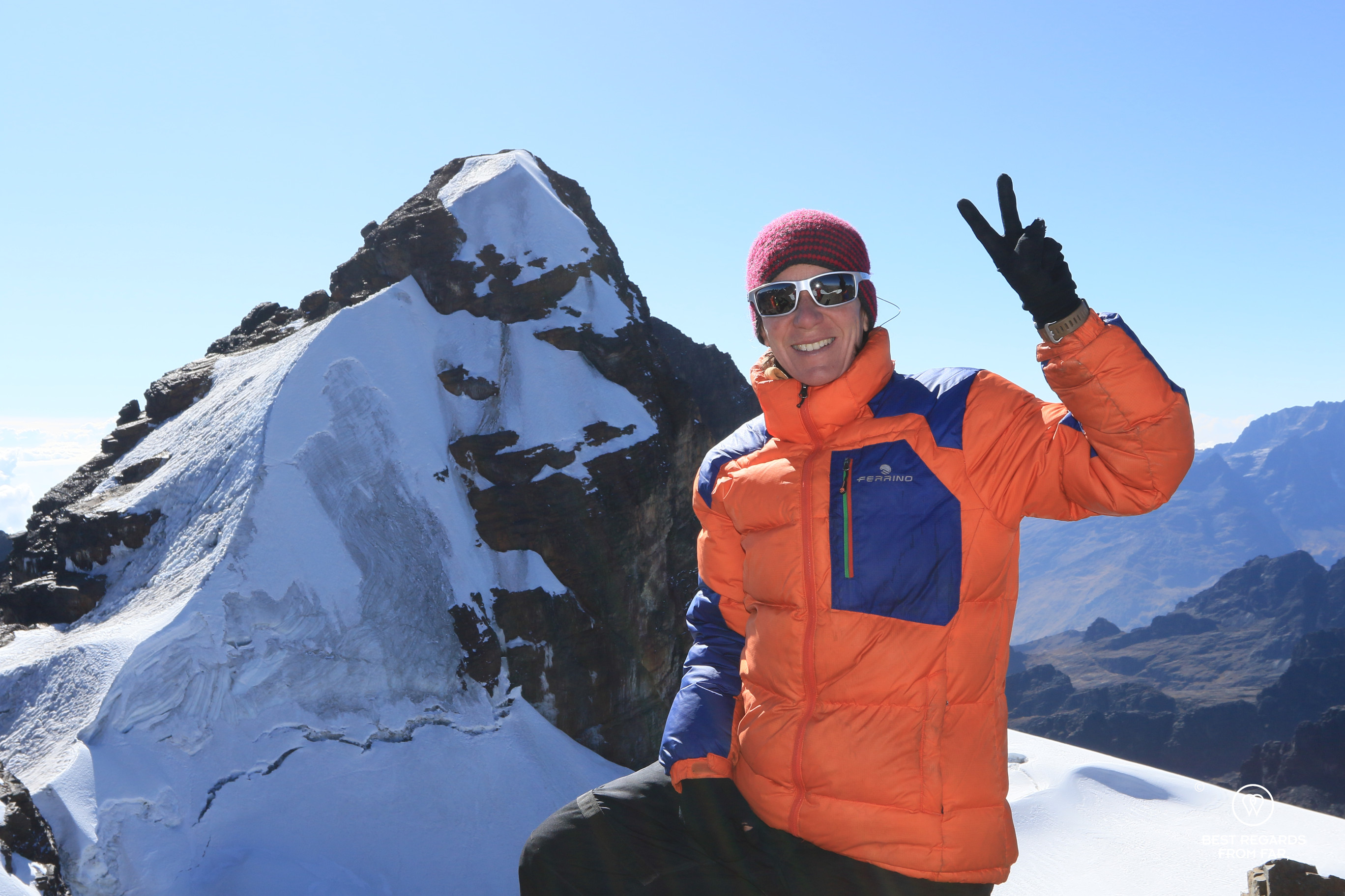 Photographer Claire Lessiau atop Tarija summit.