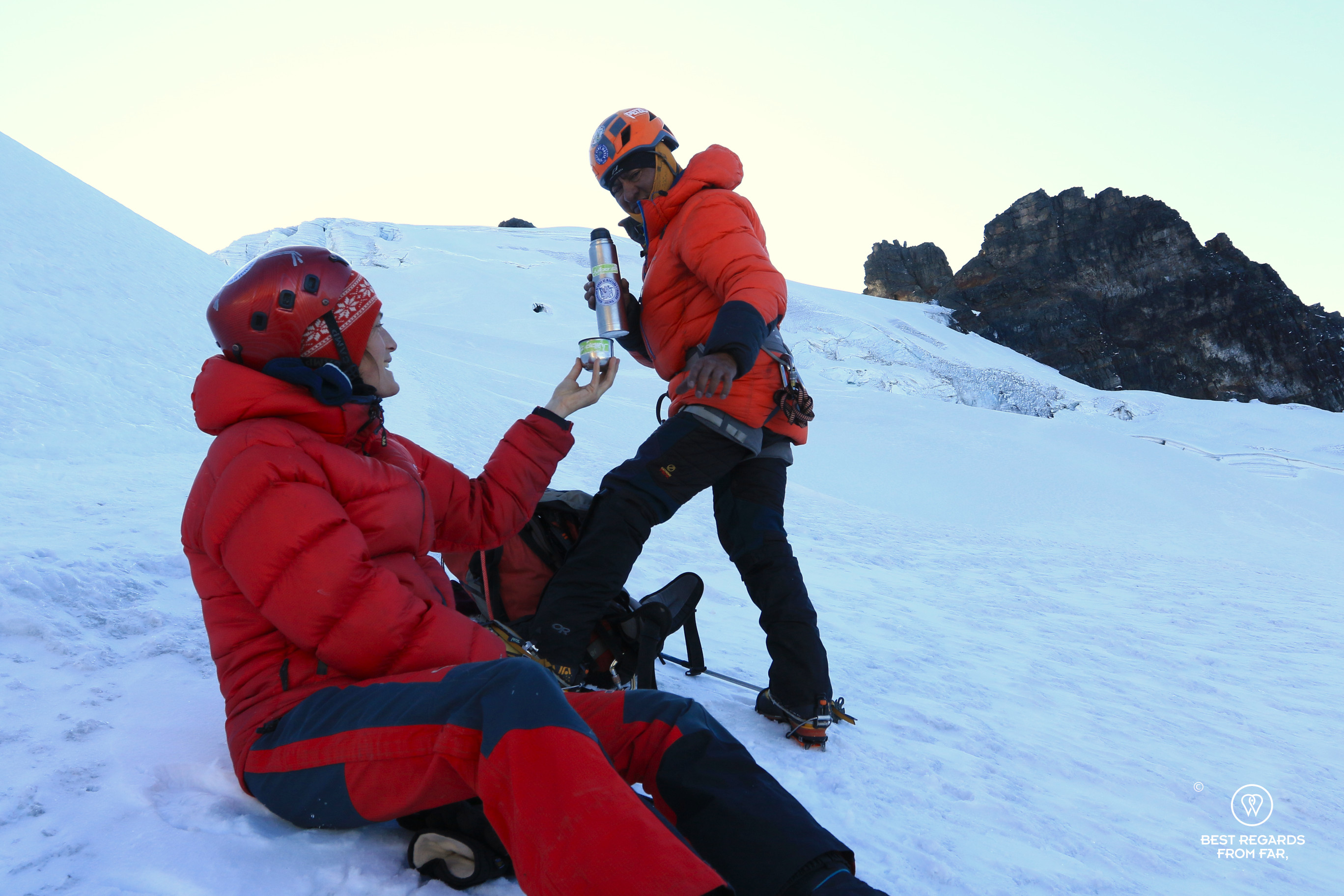 High-mountain guide giving a coffee to author Marcella van Alphen on the Tarija glacier.