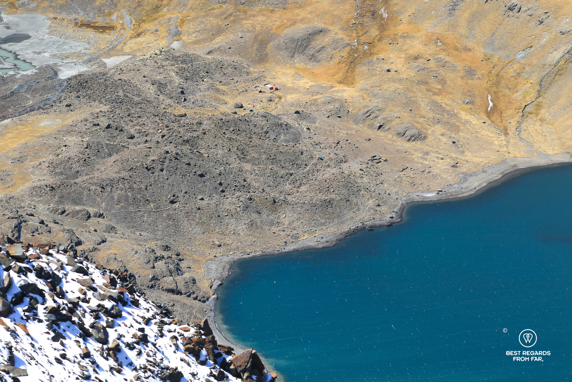 Barely visible Condoriri Camp from the summit of Pico Austria.