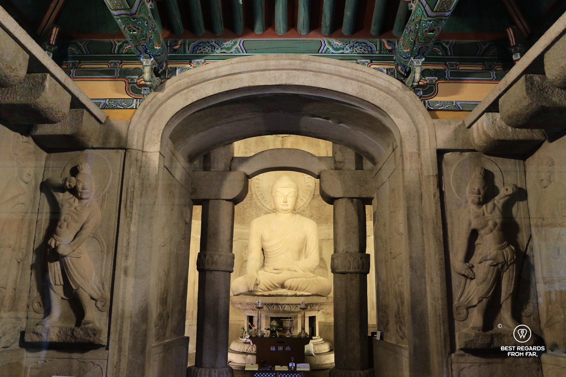 Majestic stone Buddha inside Seokguram Grotto in South Korea.