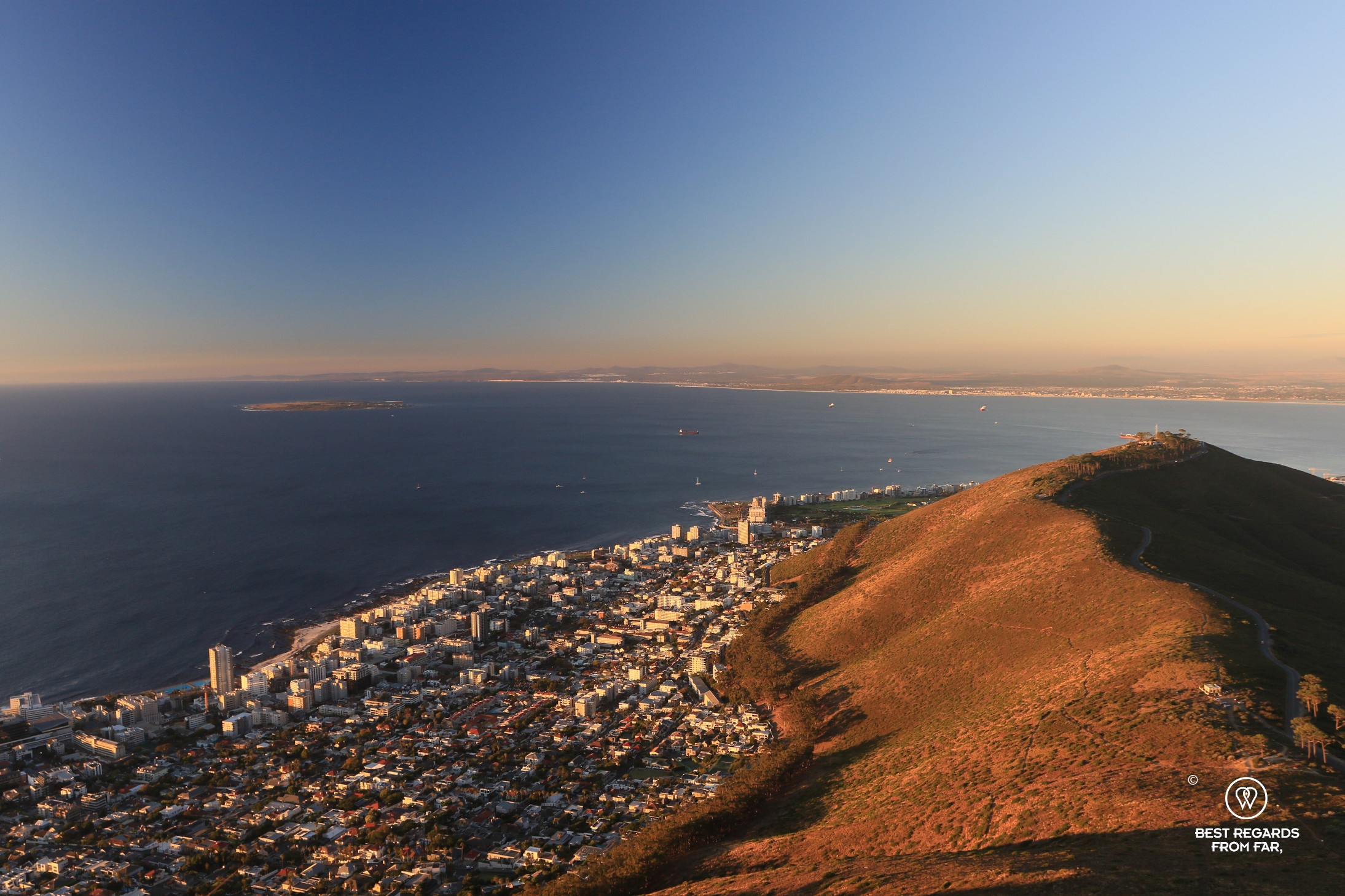 View on Signal Hill with Sea Point to its left and the Atlantic Ocean from Lion's Head at sunset.