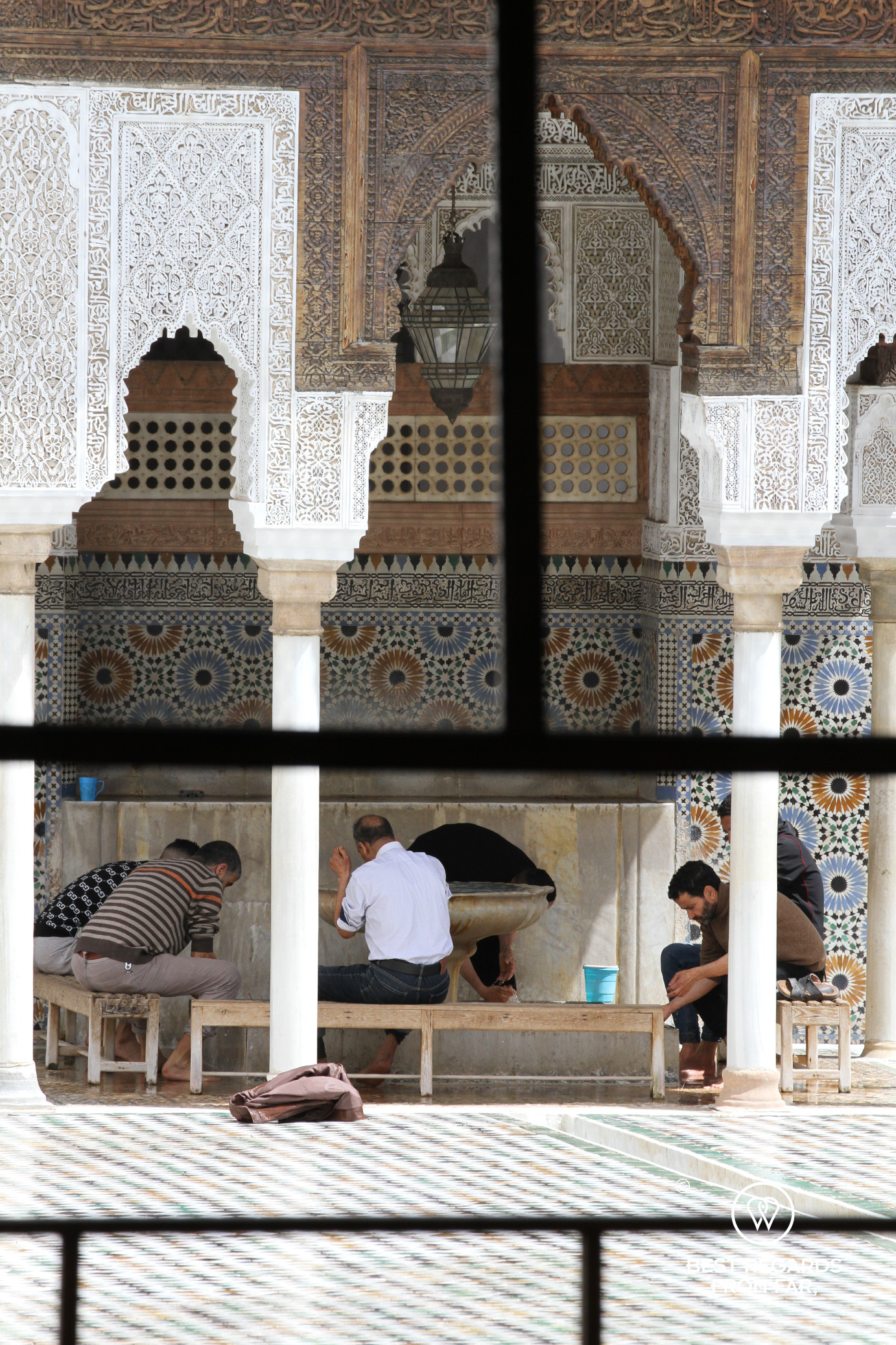 Men washing before prayer at the Al-Quaraouiyine mosque (and university) in the medina of Fez.