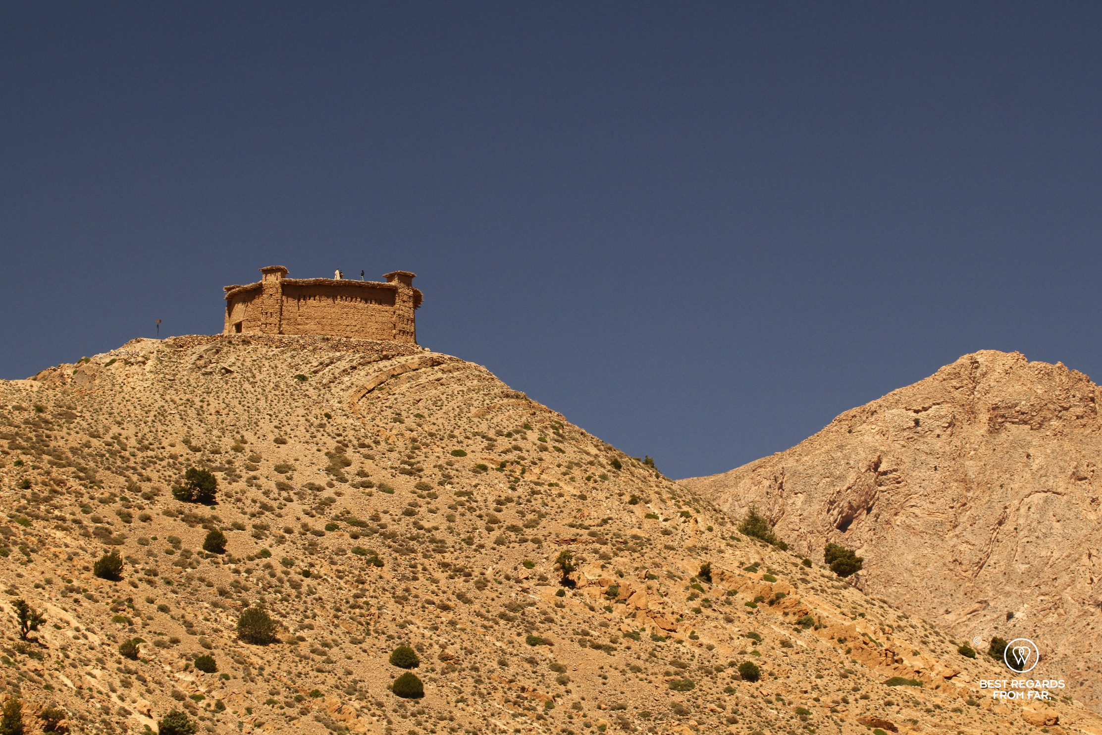 Granary overlooking the Happy Valley in a arid landscape in Morocco.