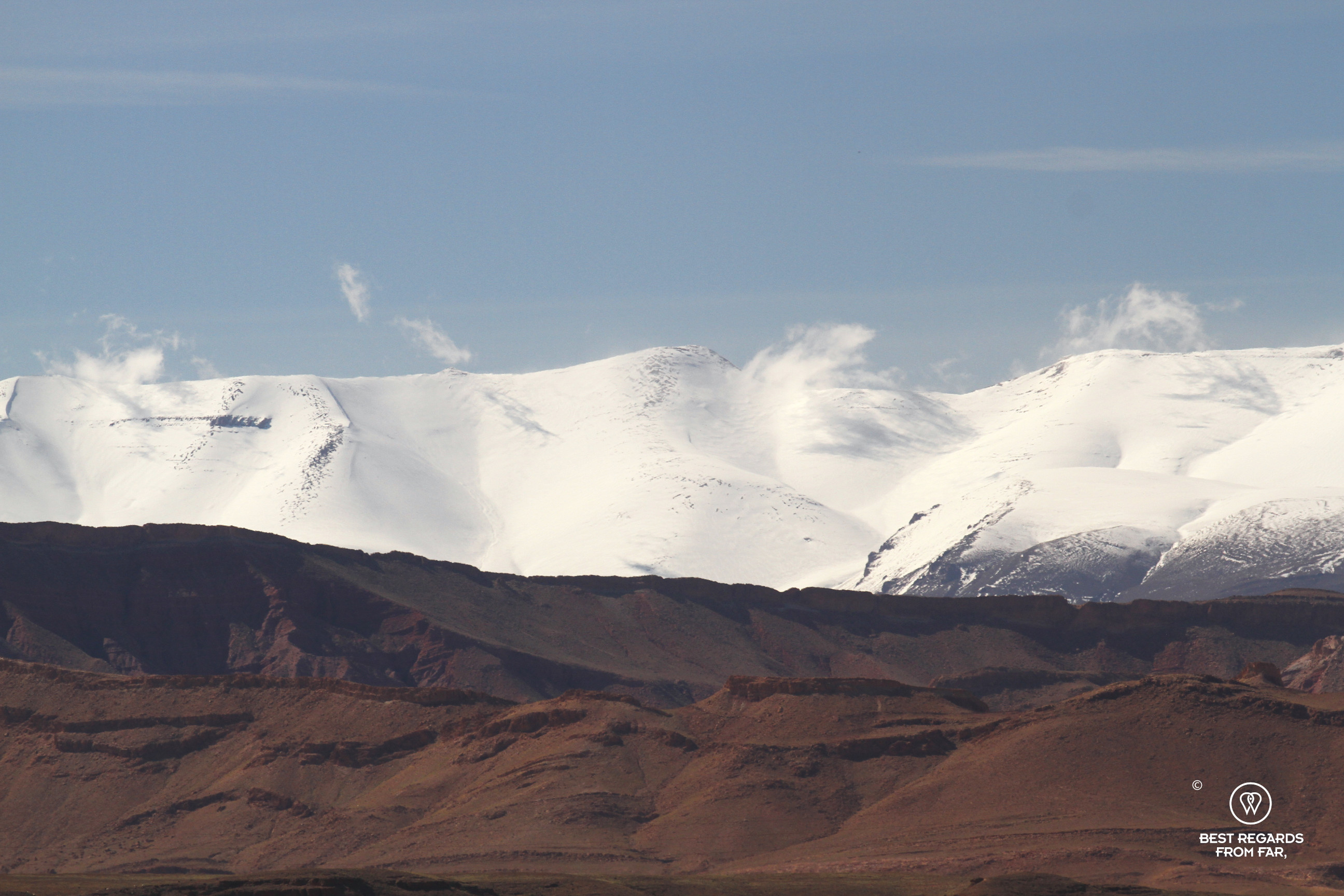 Snow-capped M'Goun Peak from the Valley of the Roses in Morocco.