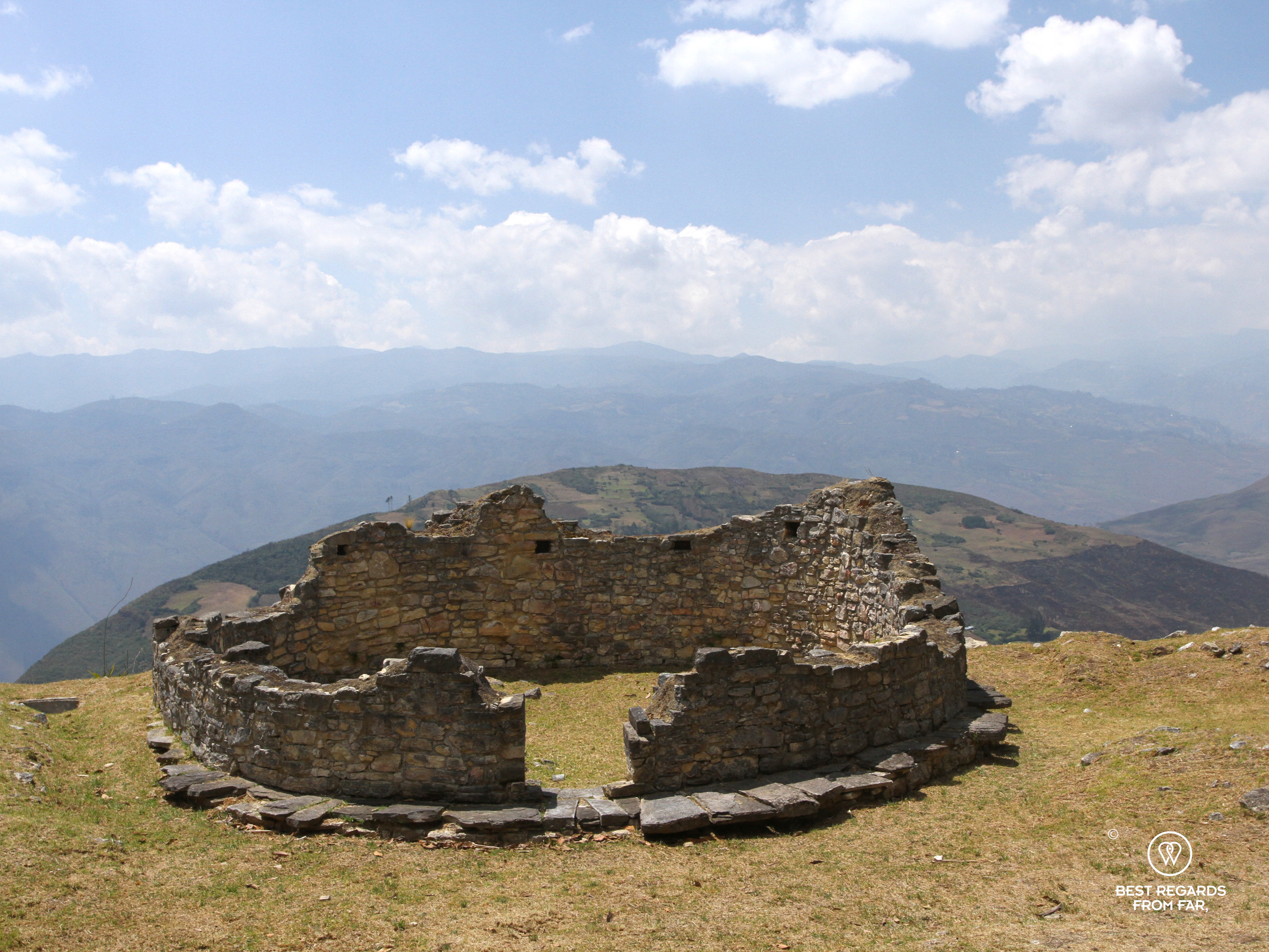 A circular dwelling with a view on the Andes in the Chachapoyas ruins of Kuelap.