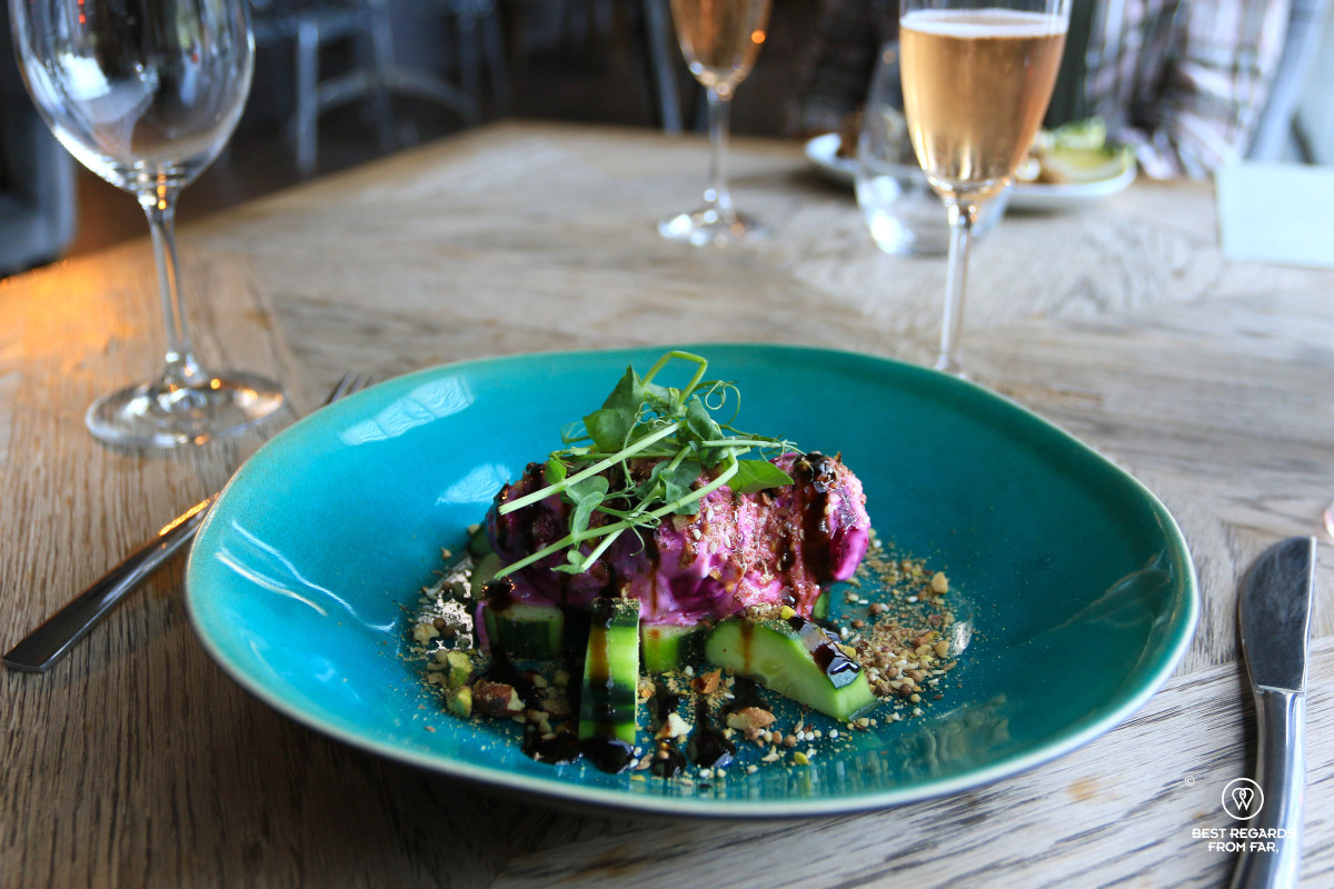 Beetroot carpaccio plated in a turquoise dish at the BluVines restaurant in Montagu.