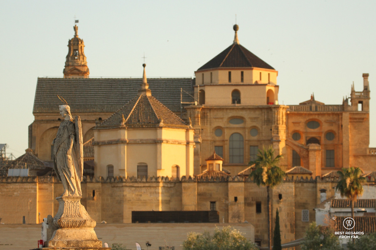The Cordoba Mosque Cathedral from the Roman Bridge at sunrise.