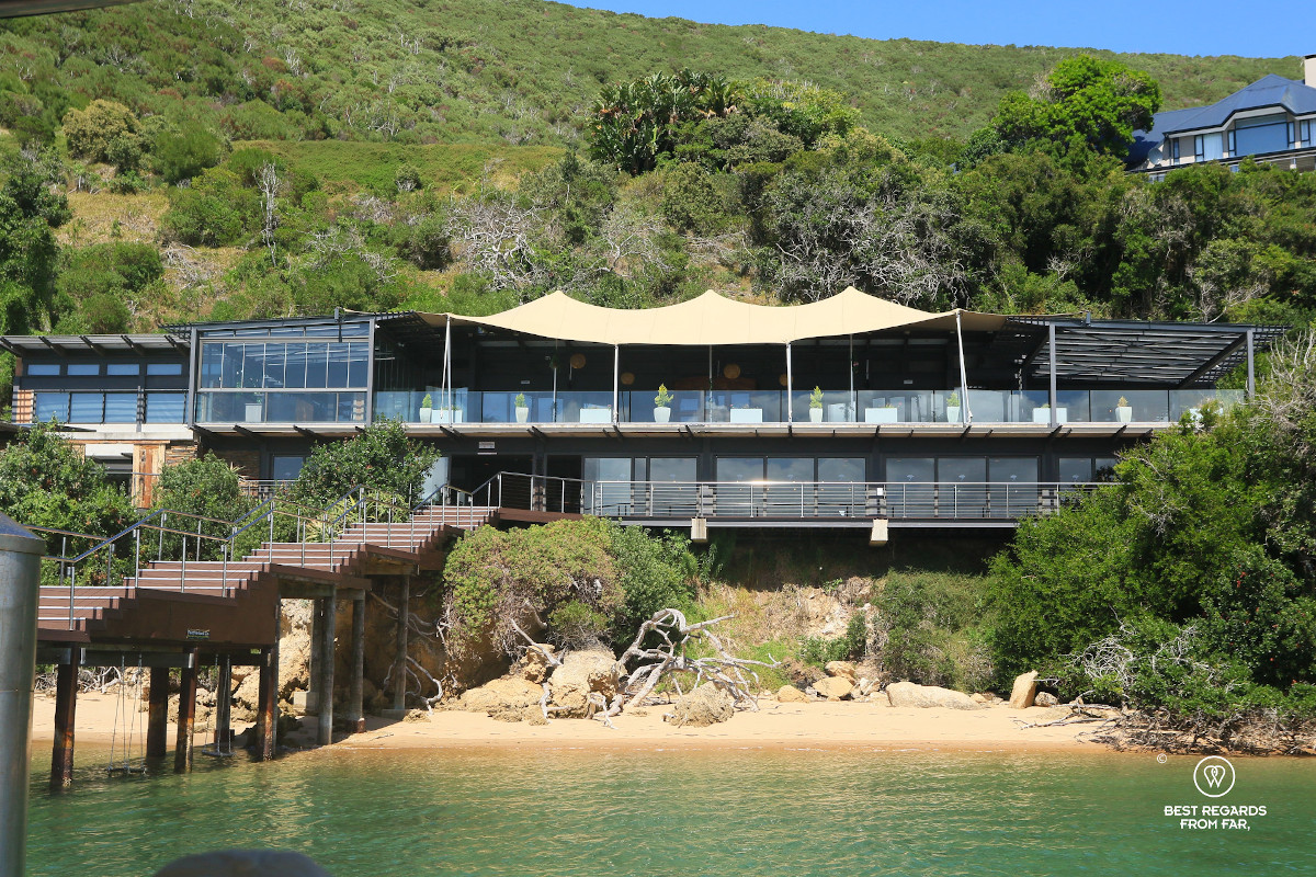 Modern building and staircase leading from a dock to the shore of the The Featherbed Nature Reserve.