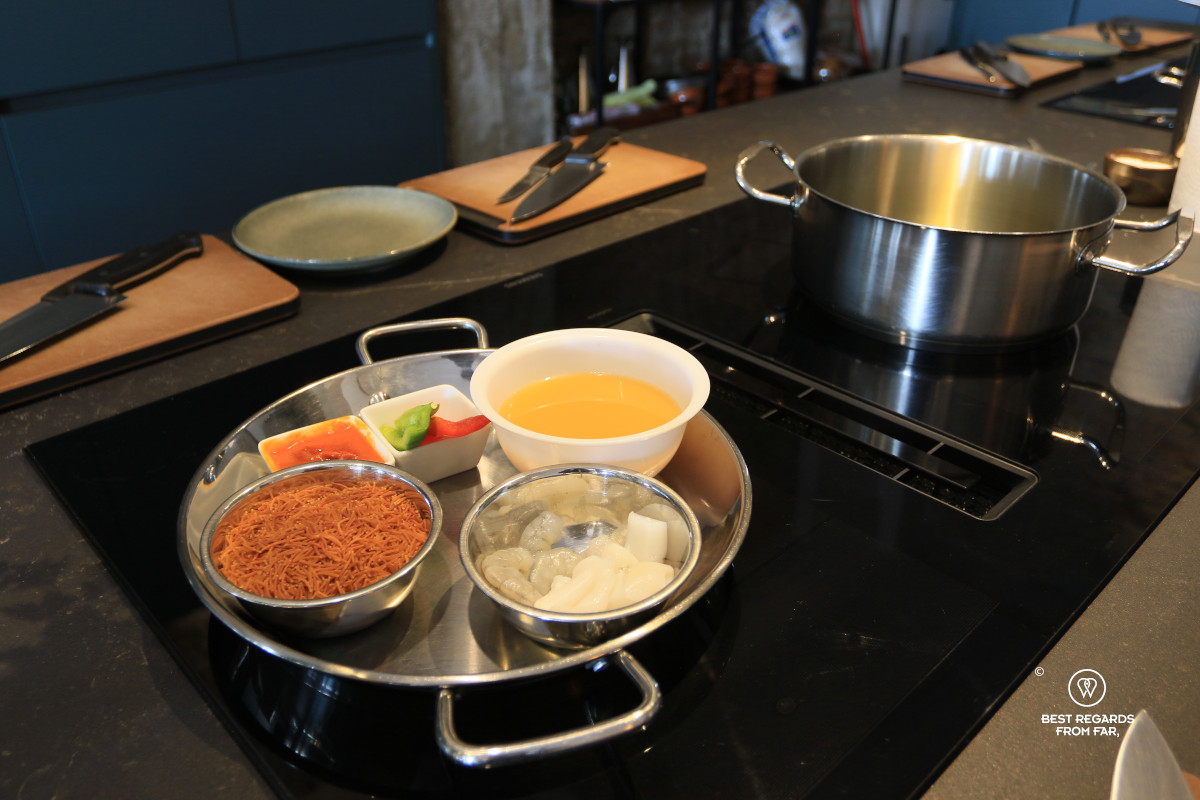 Ingredients to cook fideos tostados in a kitchen.