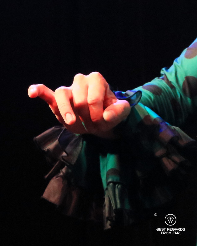 Close up on the hand of a flamenca dancer.