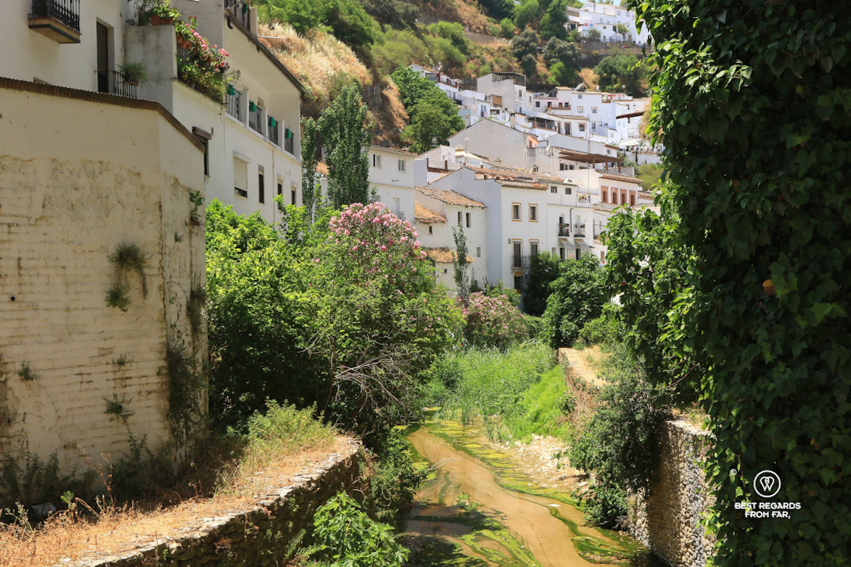 Stream flowing through the white Andalusian village of Setenil de las Bodegas.