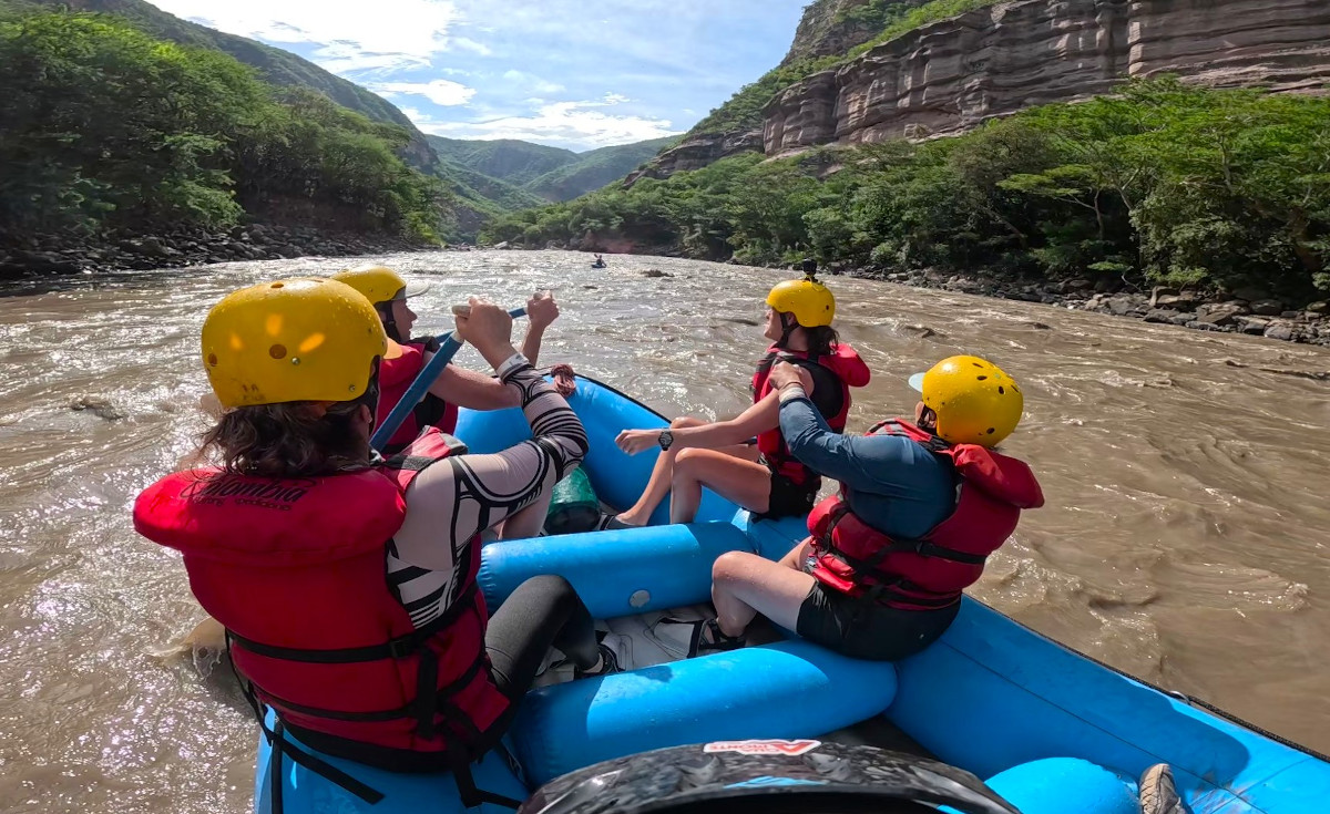 Rafting the Chicamocha Canyon in Colombia with its lush vegetation.