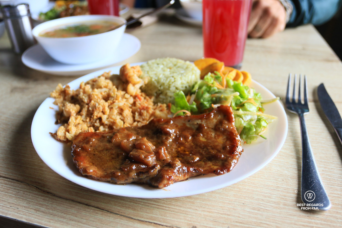 The menu del dia: pork with pineapple sauce.
