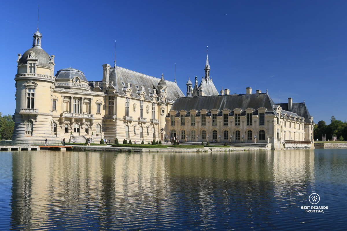 Castle of Chantilly from the back with the water.
