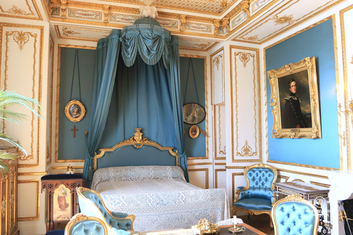 The blue bedroom of the Duchess of Aumale in the private apartments of the Castle of Chantilly.
