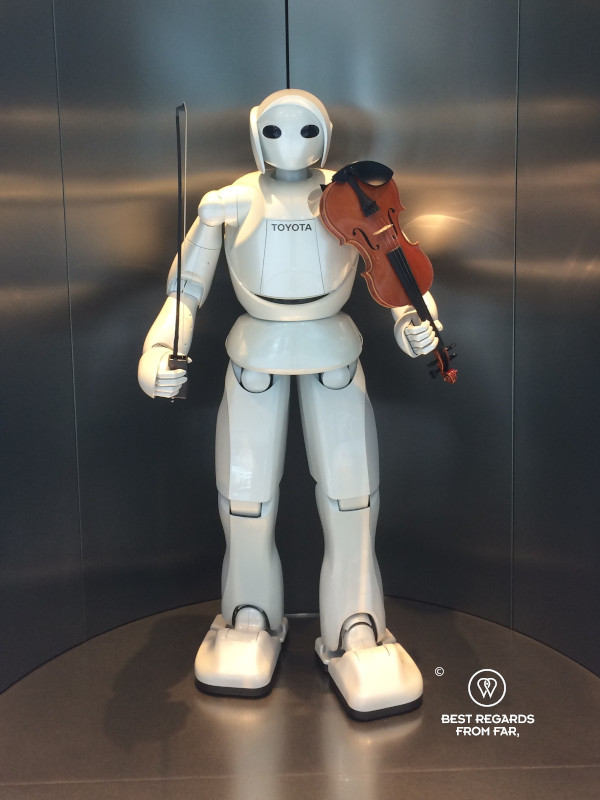 A musician robot holding a violin at the Toyota factory in Japan.