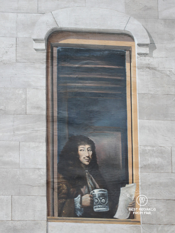 Intendant Jean Talon with a pint on the who's who mural of Quebec City.