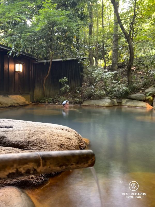 Relaxing in an onsen in a ryokan of Kurokawa.