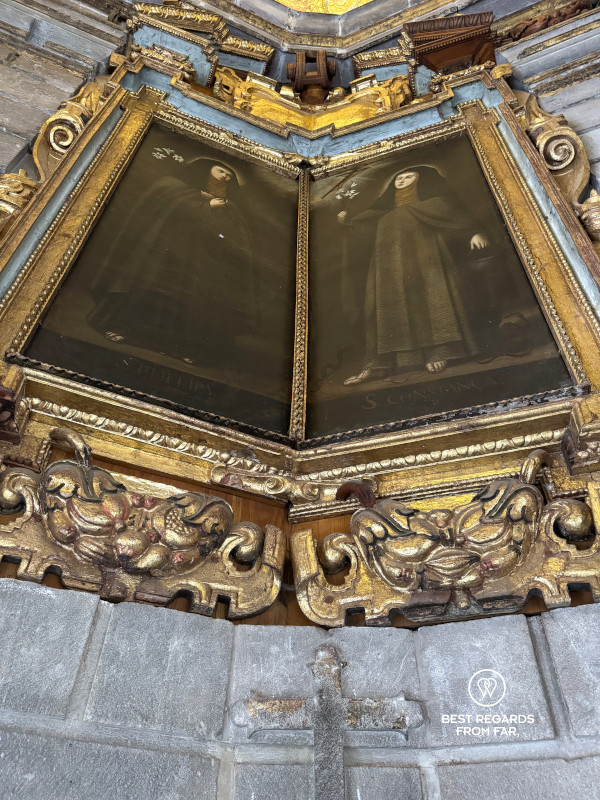 Saints and cacao pods inside the San Francisco Church in Quito.