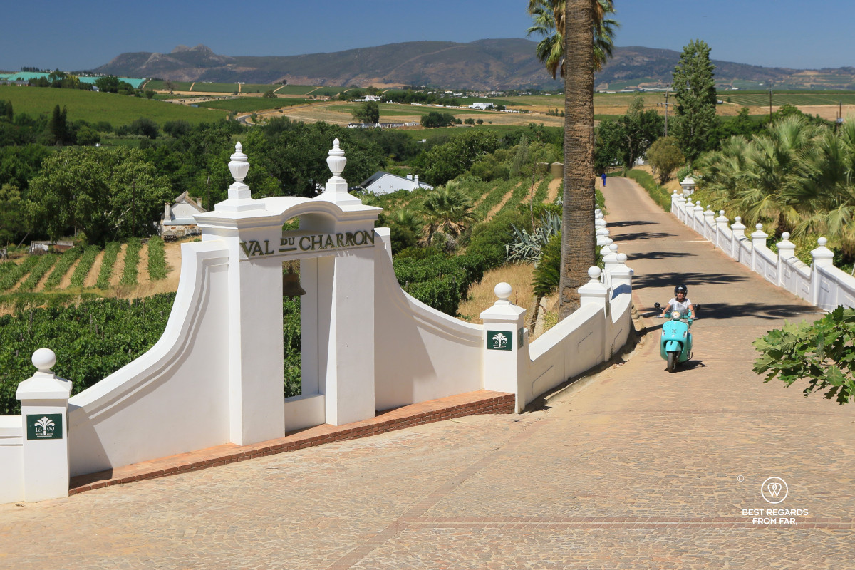 Woman arriving at Val du Charron on a pistachio scooter.