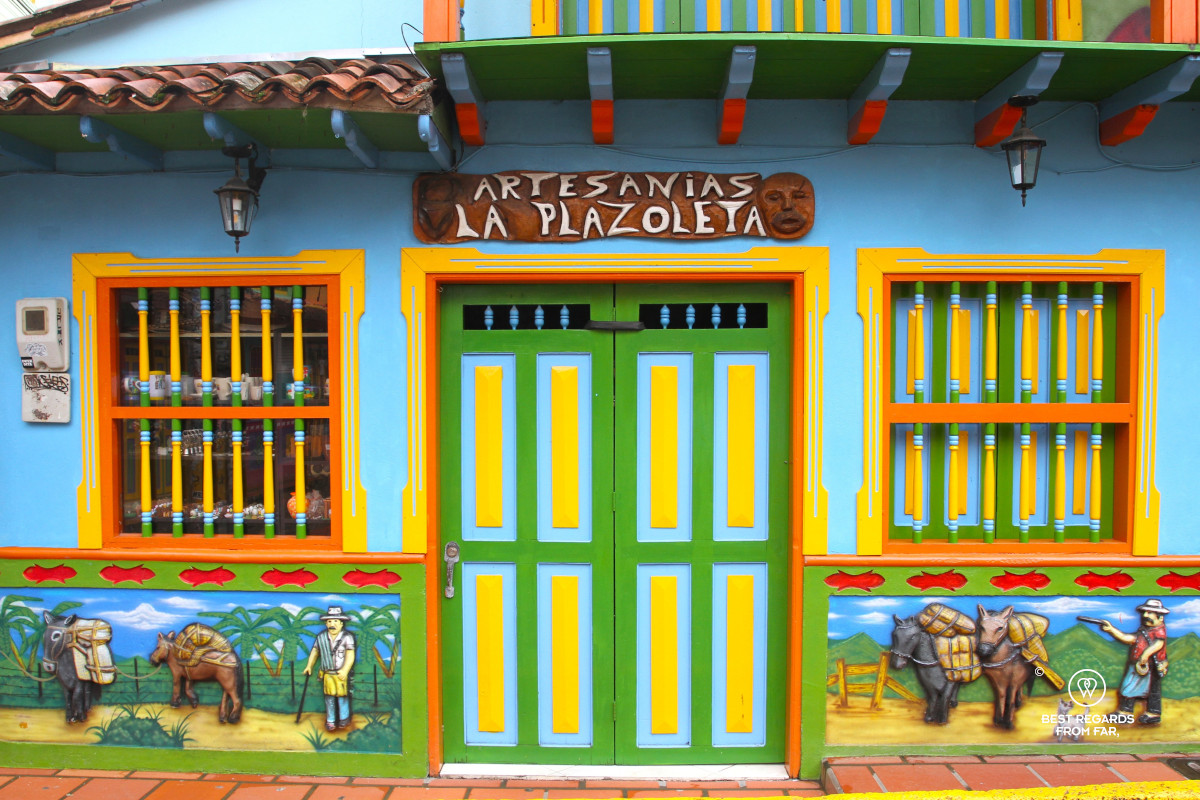 Zocalo murals in Guatape showing rural life.