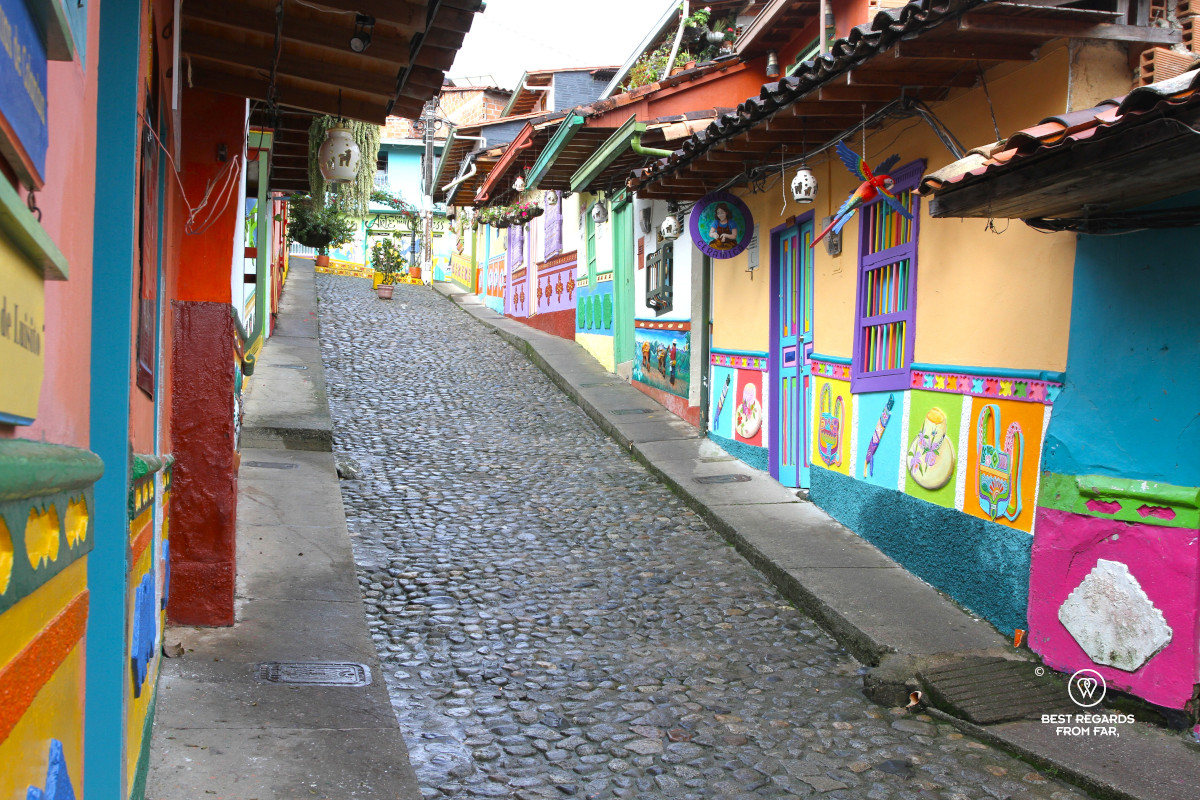 Zocalo murals along a street in Guatape.