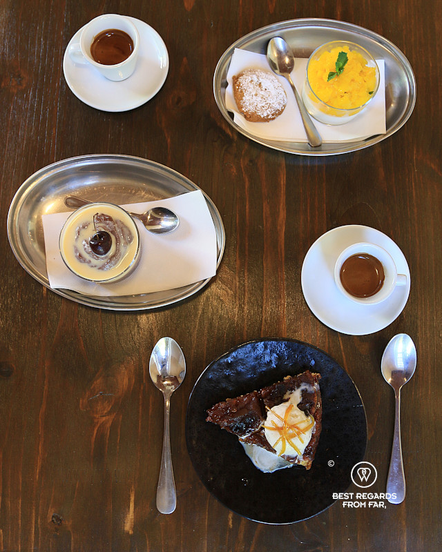 Desserts of lemon cream, tarte tatin, chocolate and cherries at The Melting Pot in Cape Town.