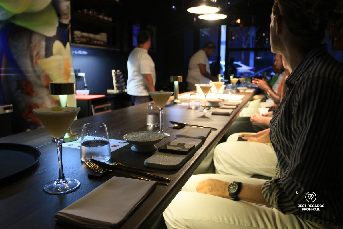Patrons seated at hte bar at The Wiggle Room in Cape Town.