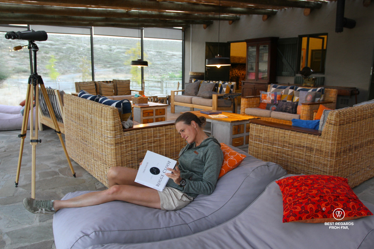 Author Marcella van Alphen reading in the living room at Rogge Cloof.