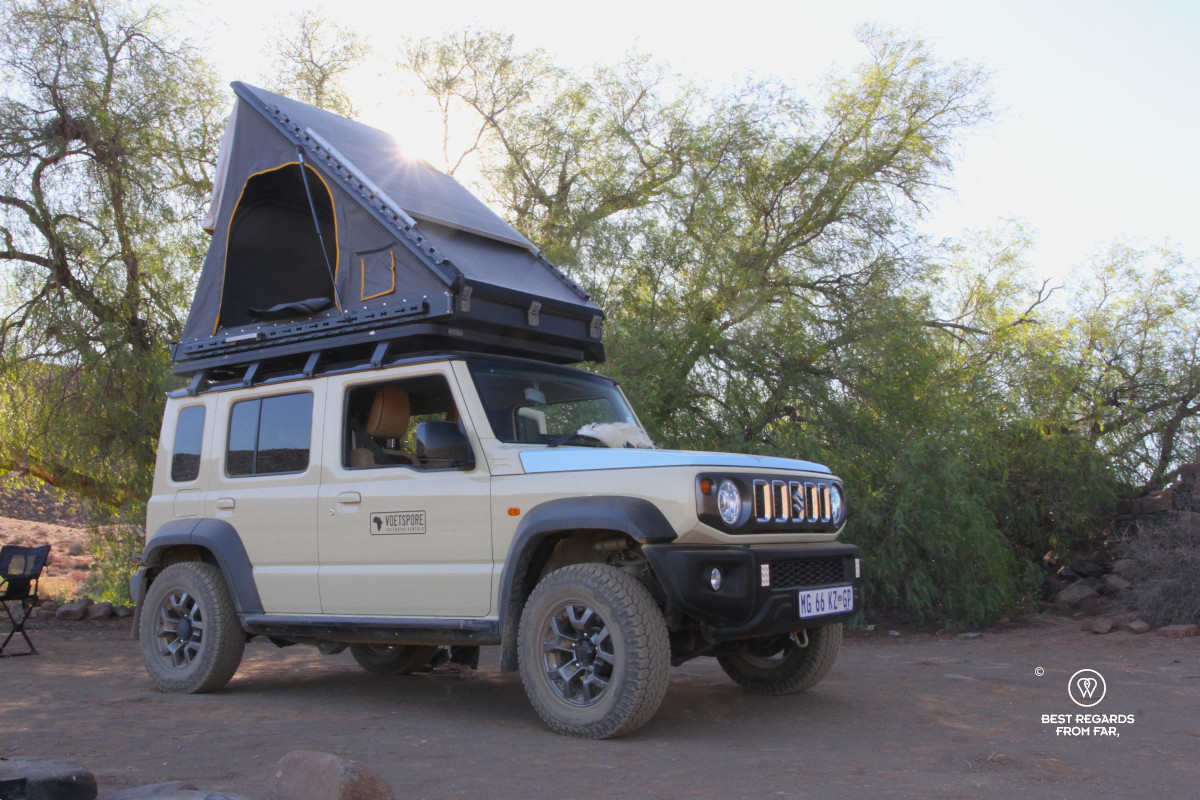 Beige Voetspore Suzuki Jimny with rooftop tent out at the Skaapwagterspos.