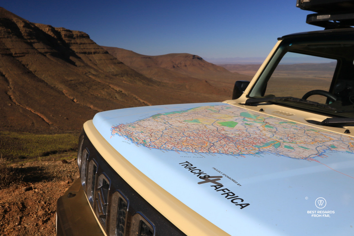 Bonnet of a Suzuki Jimny with the Track 4 Africa map printed on it.