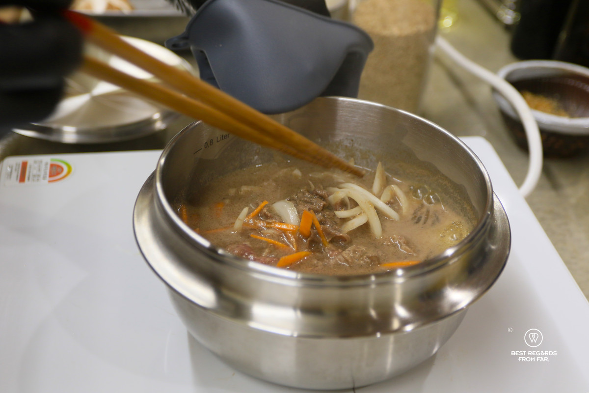 Cooking Bulgogi during the Busan cooking class.