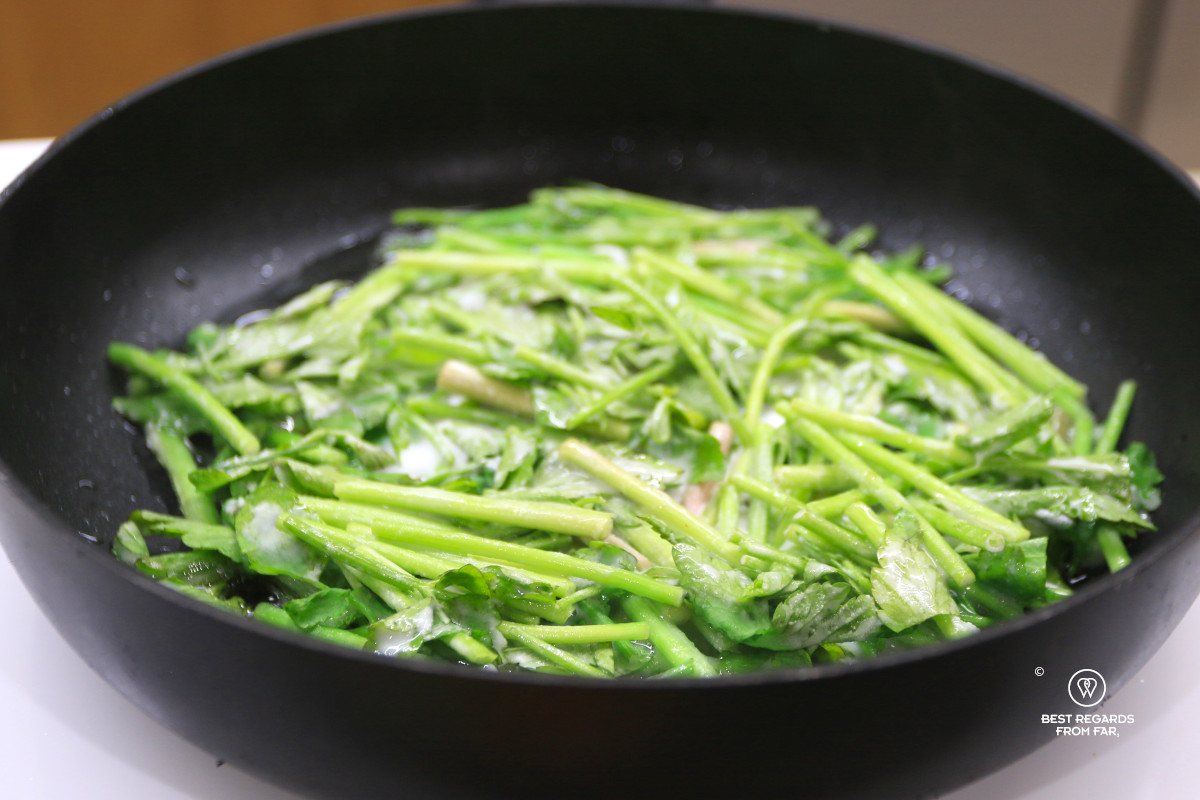 Cooking savory pancake in South Korea.