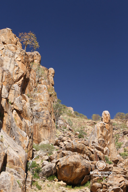 Interesting rock formations contrasting with a deep blue sky.