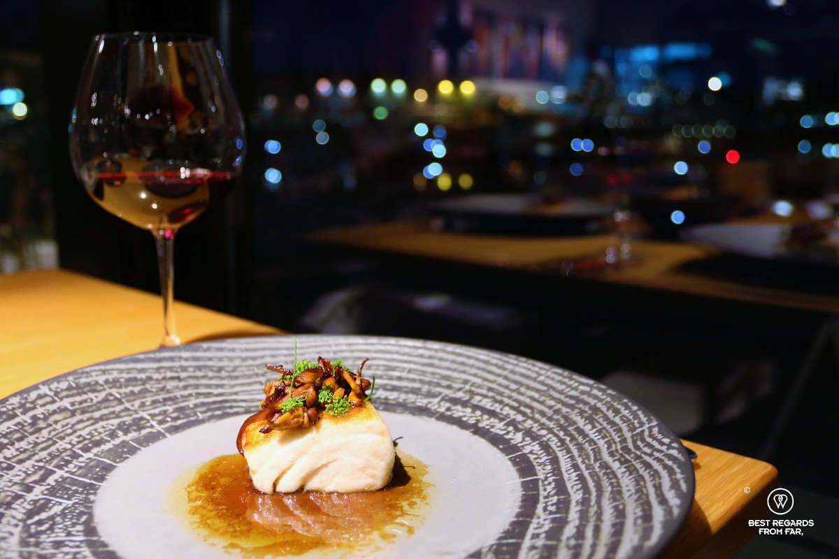 Halibut and chanterelle with dill, almond cauliflower at Fiskekompaniet restaurant in Tromso.