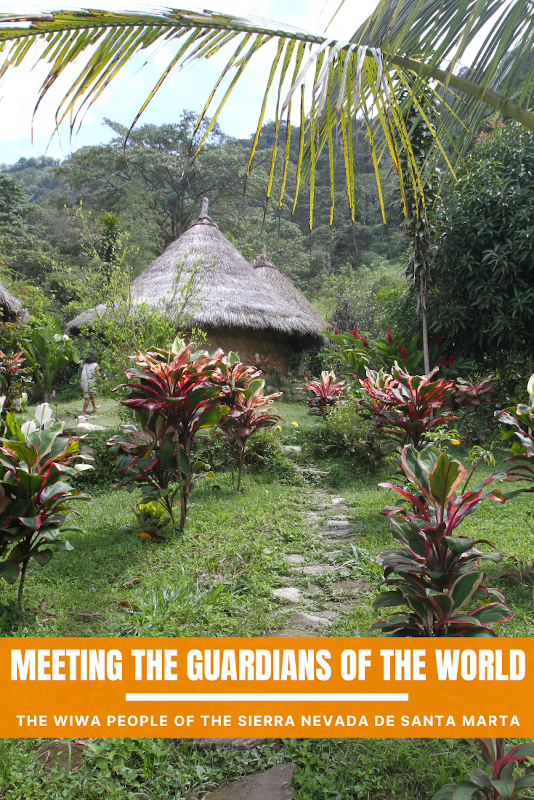 Pinterest pin of a Wiwa home with the text: "Meeting the guardians of the world, the Wiwa people of the Sierra Nevada de Santa Marta".