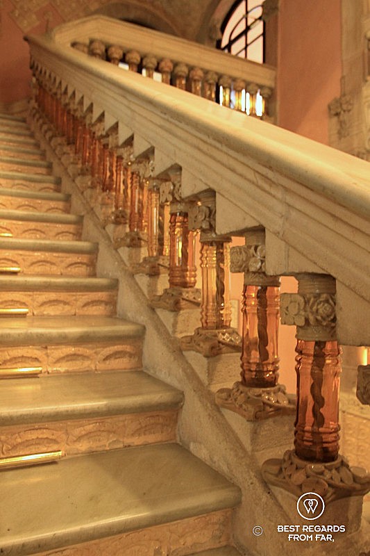 The marble and glass staircase of the Palau de la Musica Catalana.