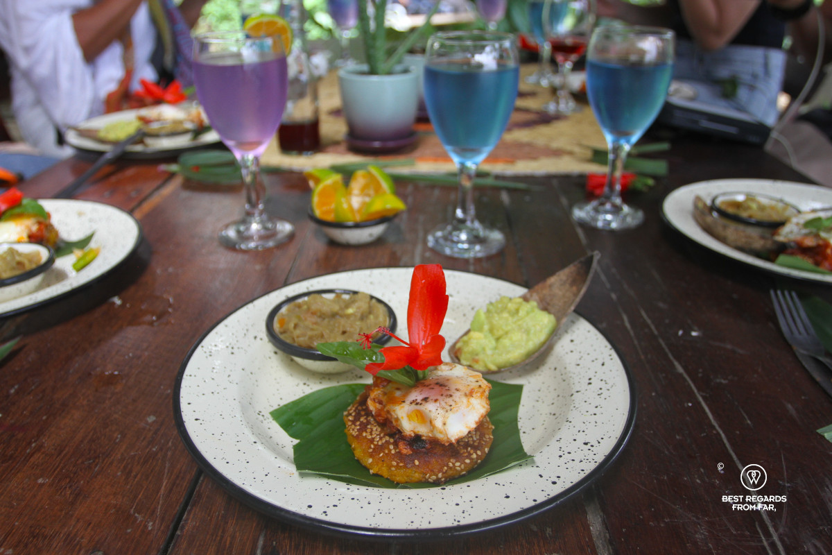 Wooden table with colorful drinks and bites, Plan B, Farm to Table.