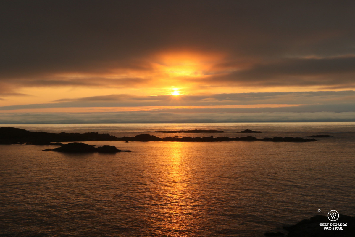 Sunset on the sea with small islands in Stø in Norway.