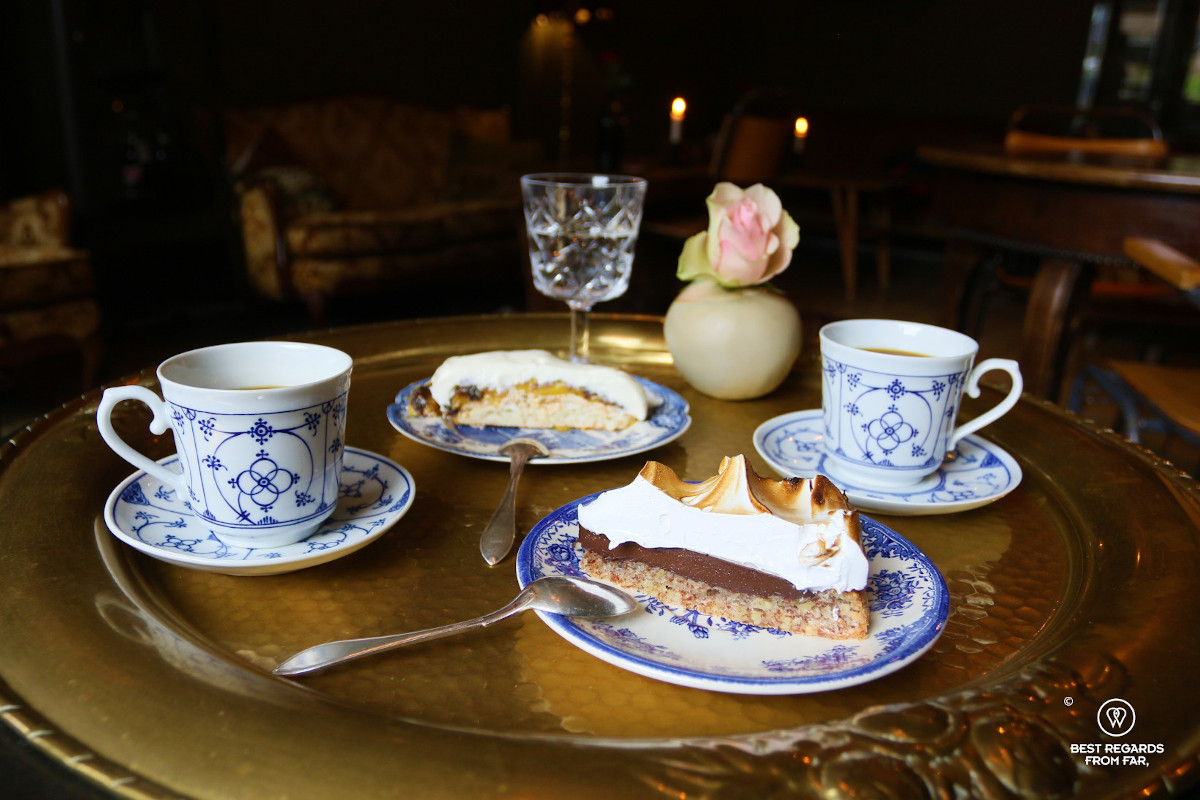 Cakes served in vintage plates at Svermeri, Tromso, Norway.