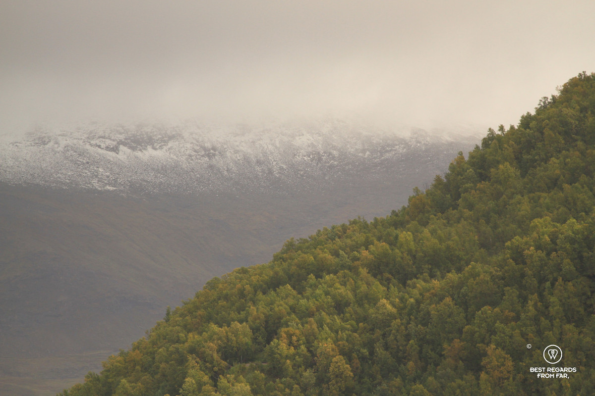 View on the snowy mountains surrounding Tromso, Norway.