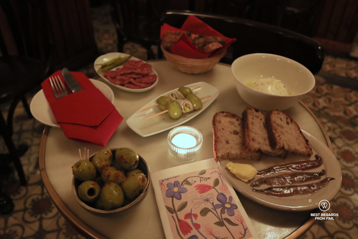 Table filled with different tapas dishes in Spain.