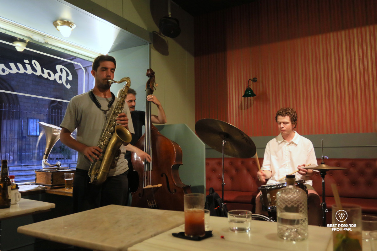 Small jazz band performing in a bar.